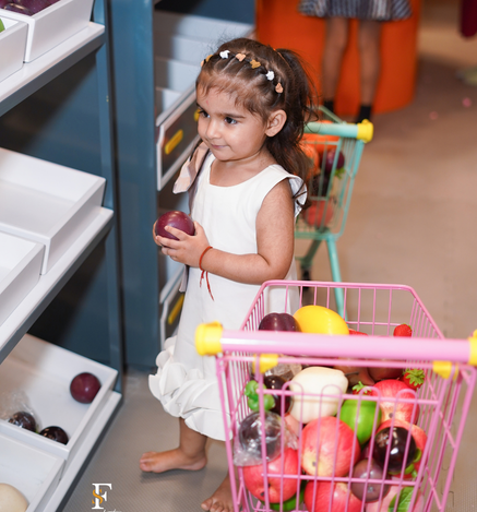 Child enjoying imaginative role play at Wooray Elite Ludhiana
